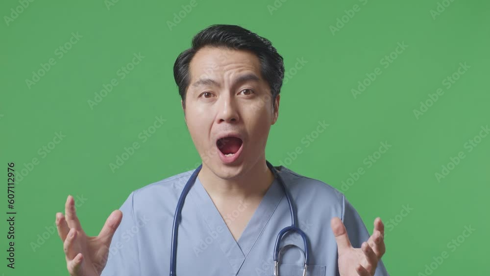 Close Up Of Asian Male Doctor With Stethoscope Showing Gesture Hands Palm, Saying Wow, And Smiling On Green Screen Background In The Hospital
Close Up Of Asian Male Doctor With Stethoscope Showing Gesture Hands Palm, Saying Wow, And Smiling On Green Screen Background In The Hospital