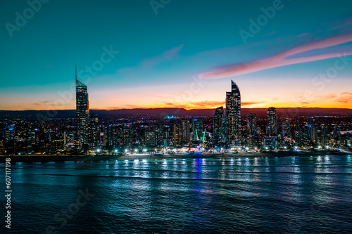 Golden Skyscrapers: Captivating Sunset Over Surfers Paradise, Australia, Revealing the Majestic Cityscape from Ocean Heights