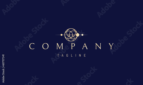 Vector golden logo on which an abstract image of a pattern in the form of a dream catcher in space.
