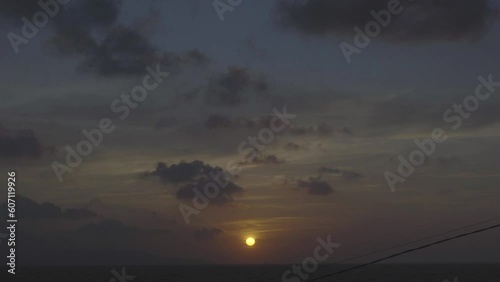 timelapse sunset on ocean in a clear day
