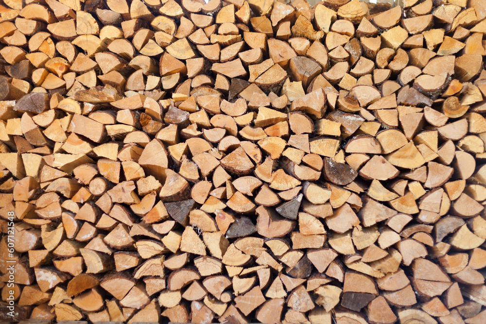 wooden log wall texture. brown background. natural pile cut logs close up pattern wooden log wall texture. brown background. natural pile cut logs close up pattern