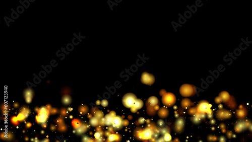 Particles of gold and glowing colored bokeh circles, sparkling gold dust. Abstract luxury decoration background.
