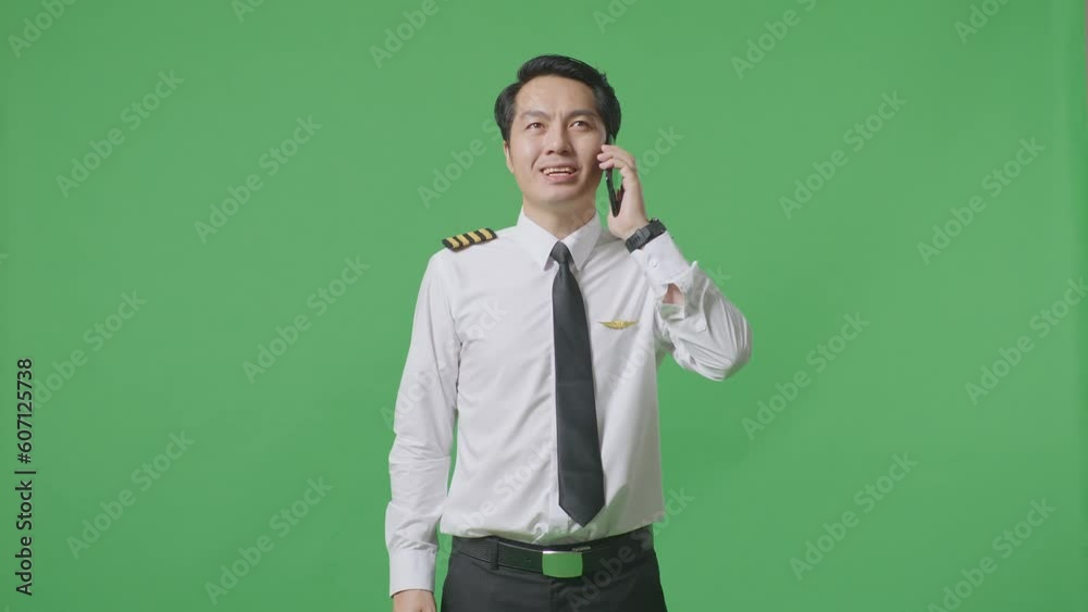 Asian Man Pilot Talking On Smartphone And Looking Around While Standing In The Green Screen Background Studio
Asian Man Pilot Talking On Smartphone And Looking Around While Standing In The Green Screen Background Studio