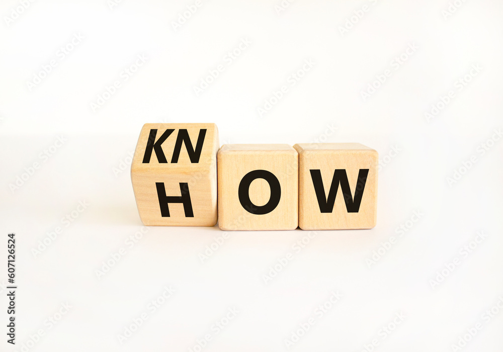 Know how symbol. Businessman turns wooden cubes and changes the word How to Know. Beautiful white table white background. Copy space. Business and know how concept. - obrazy, fototapety, plakaty 