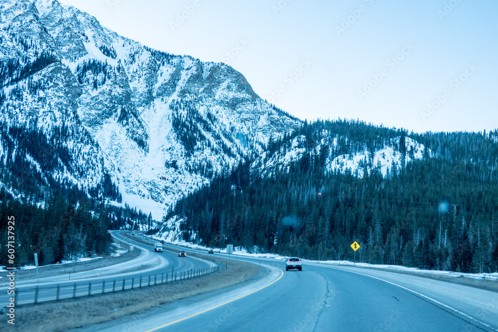 driving through colorado rockies and ski resort mountains