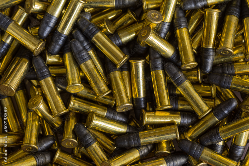 Small caliber .22 bullets as a background Small caliber .22 bullets as a background