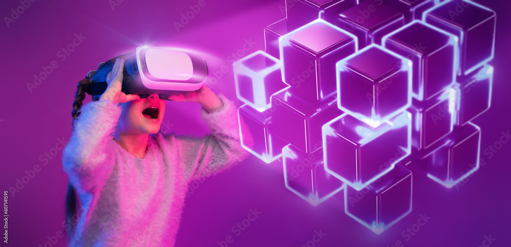 Excited little girl wearing vr glasses enjoying online game with glowing neon virtual cubes, neon purple background