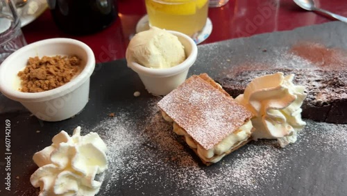 delicious café gourmand plate with French desserts in Paris