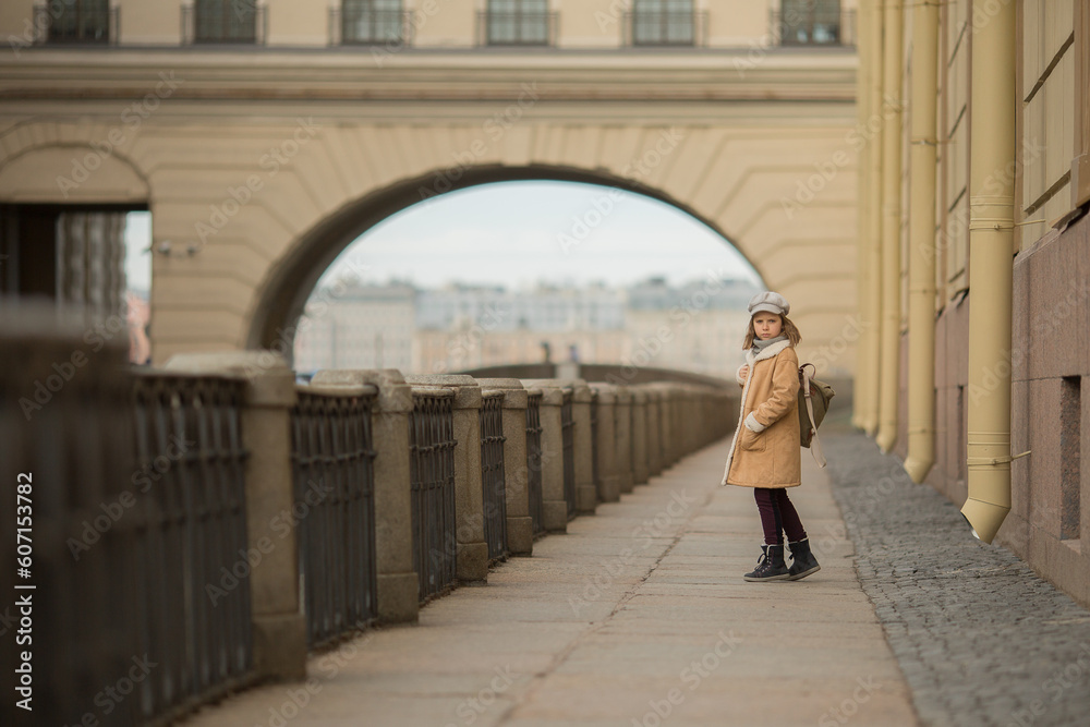 Girl walking on street of Saint-Petersburg 