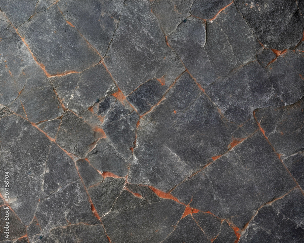 Obraz premium Fondo con detalle y textura de superficie de piedra con tonos oscuros y vetas de tonos anaranjados