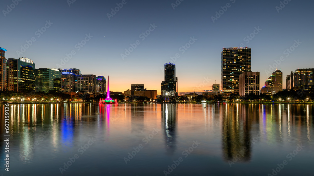 Orlando city skyline at night. Panoramic view of Orlando in Lake Eola Park, Florida, USA	