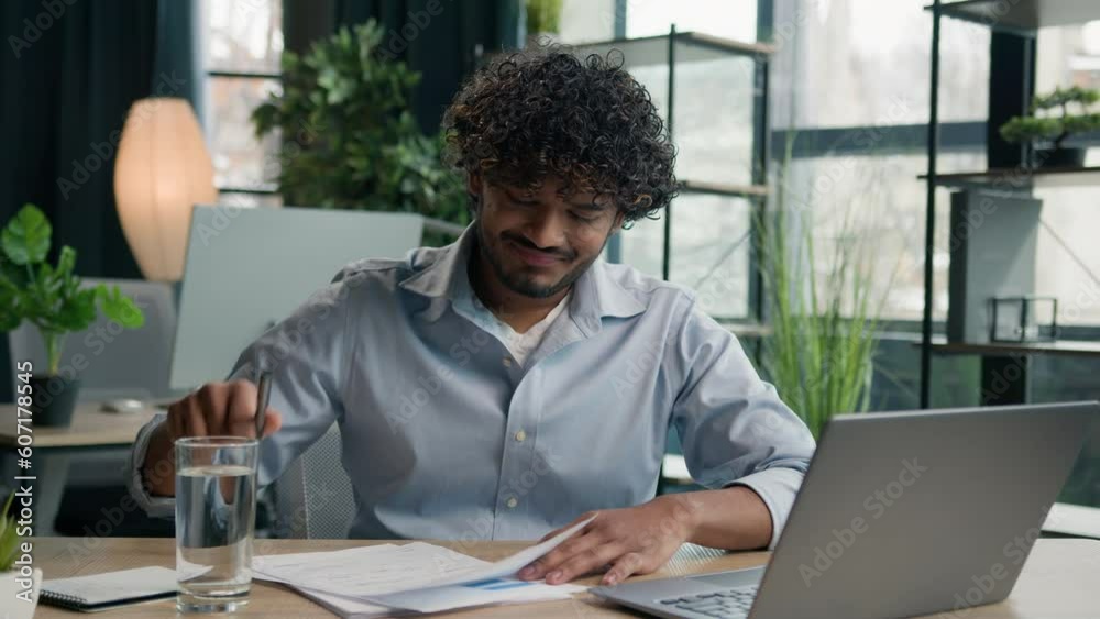 Angry furious Arabian Indian man working at office crumpling paper breakdown stress male businessman frustrated with mistake in report throwing crumpled sheet business failure no ideas wrong document Angry furious Arabian Indian man working at office crumpling paper breakdown stress male businessman frustrated with mistake in report throwing crumpled sheet business failure no ideas wrong document