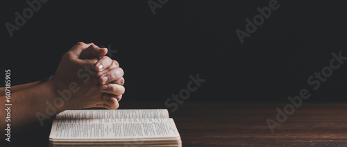 Wallpaper Mural Hands folded in prayer on a Holy Bible in church concept for faith. banner with copy space Torontodigital.ca