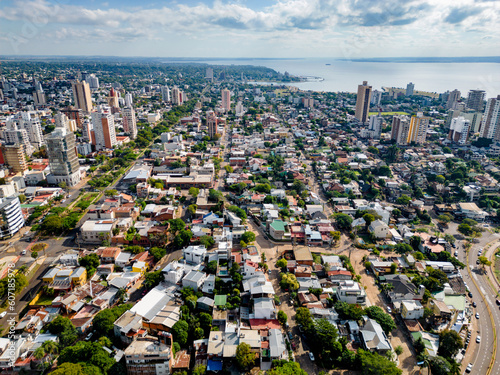 Aerial view of the city Posadas in the interior of Argentina. Buildings, vegetation and urban life.