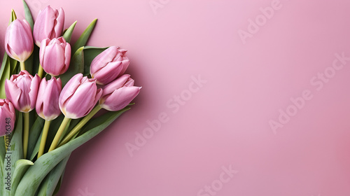 Beautiful bouquet of colorful tulip flowers on pink background, top view. Space for text Generative AI