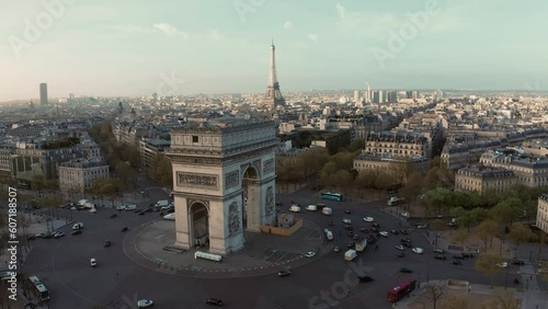 Aerial above Arc de Triumph and Eifel Tower in background at sunrise photo