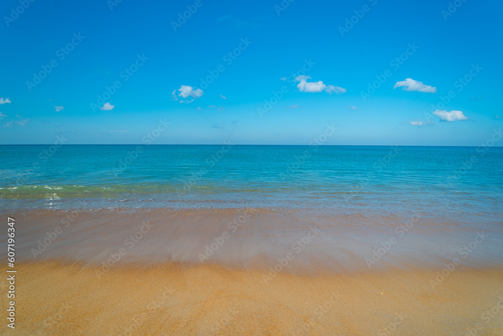 Fototapeta premium Nature view of beautiful tropical beach and sea in sunny day. Beach sea space aera
