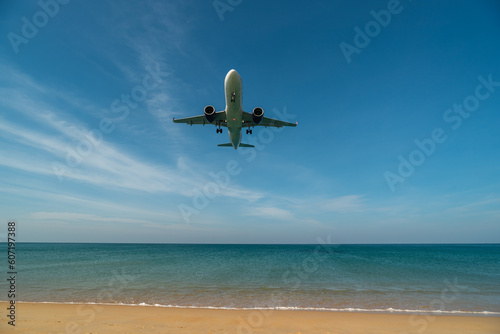 Airplane will landing near blue beach.
