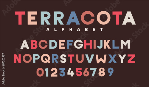 Vector alphabet in broad terracota color scheme with shades of terracota and blue, green. Typeface font for headlines, graphic design