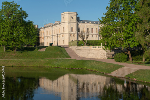 Palace and park ensemble of Gatchina Park: Karpin Pond, Gatchina Palace, private palace garden on a sunny summer day, Gatchina, St. Petersburg, Russia photo