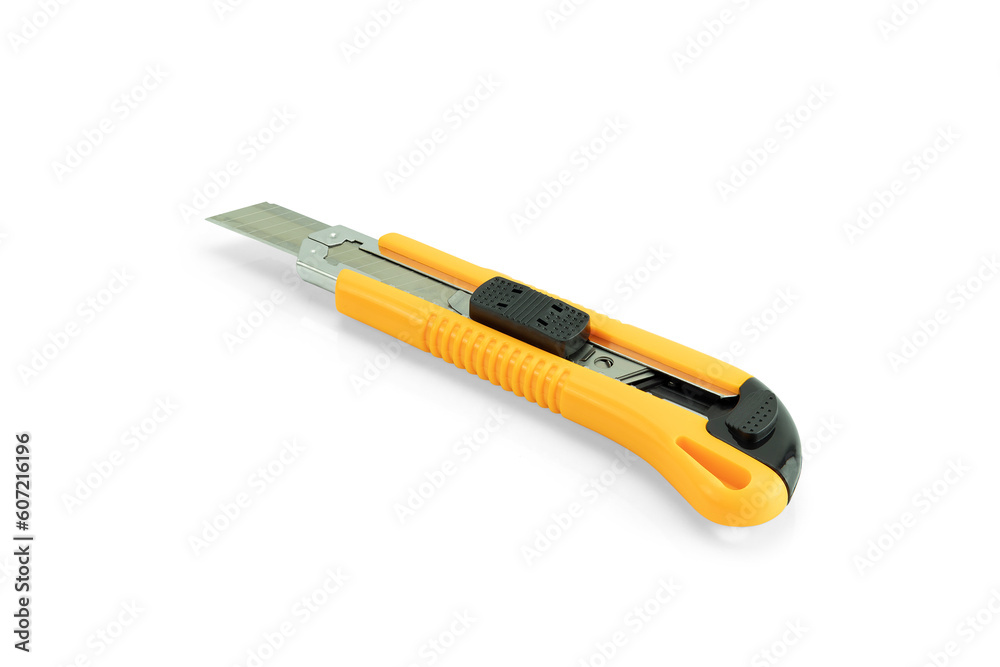 Stationery knife yellow and black Isolated on a white background with clipping path. Tools series. Cutter knife. Stationery knife yellow and black Isolated on a white background with clipping path. Tools series. Cutter knife.