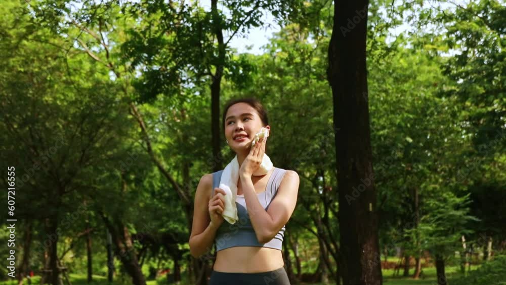 Recreation young asian woman exercising in the park : Woman with personality mental health positive attitude health care sports psychotherapy exercise warm up joyful mind good mood. Recreation young asian woman exercising in the park : Woman with personality mental health positive attitude health care sports psychotherapy exercise warm up joyful mind good mood.
