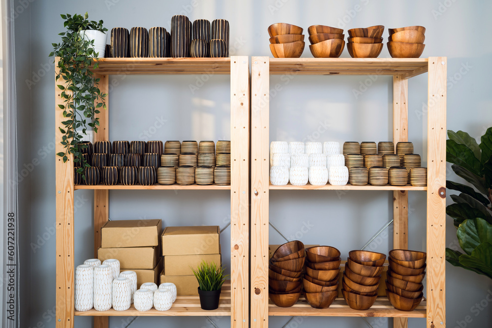 Many groups of handmade wooden vase stock on the shelf at the vase
