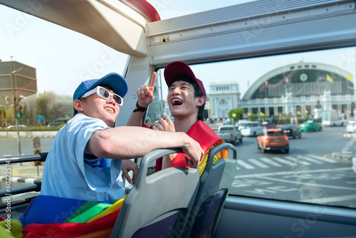 Photography Happy playful LGBTQ couple spending time together traveling on bus tour, Hualamp