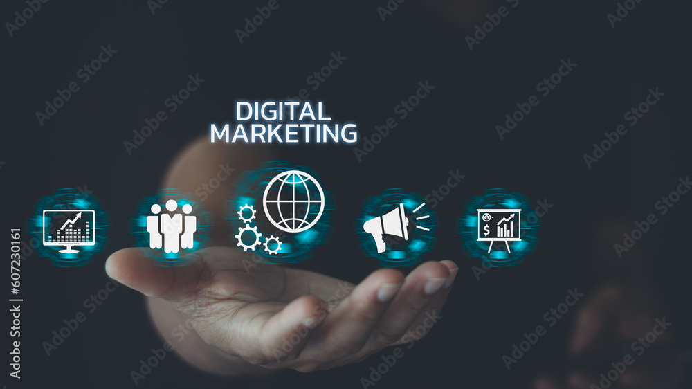 Hand shows the sign and icon of Digital marketing internet advertising and sales increase business technology concept, online marketing, E-business, E-commerce, Business online. Hand shows the sign and icon of Digital marketing internet advertising and sales increase business technology concept, online marketing, E-business, E-commerce, Business online.