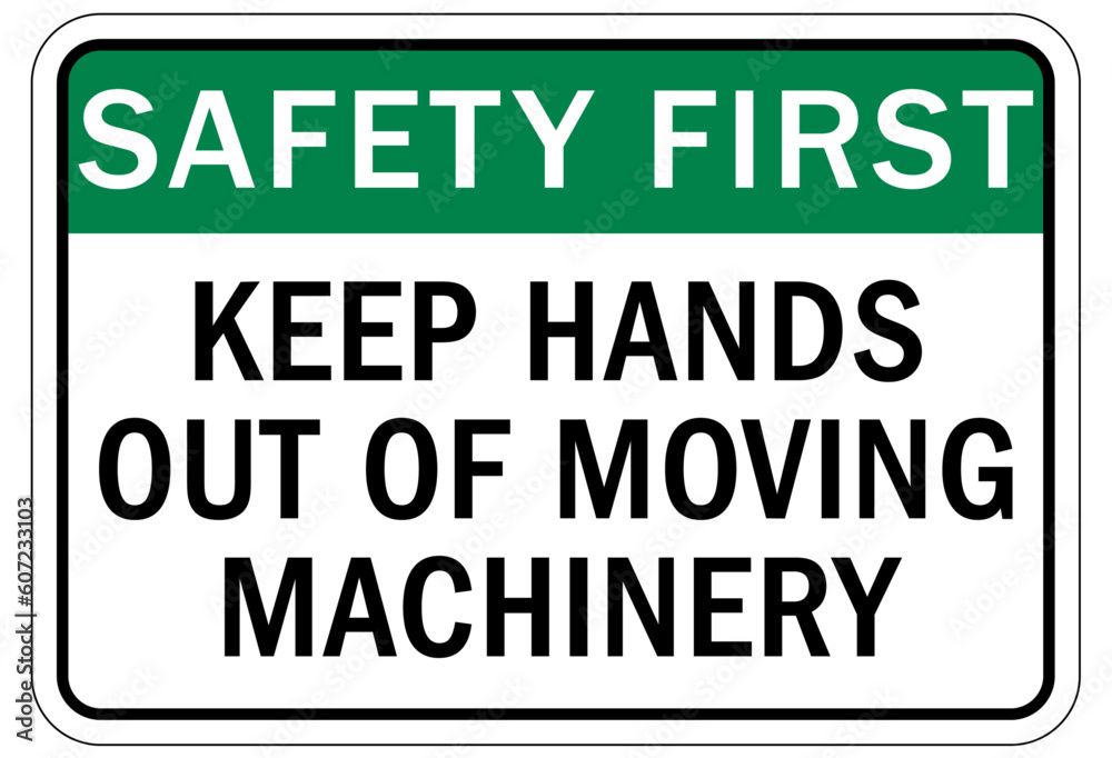 Fototapeta premium Moving machinery warning sign and label keep hands out of moving machinery