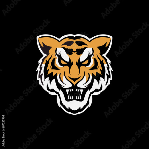 Fototapeta Naklejka Na Ścianę i Meble -  Fierceful tiger head logo in vector.