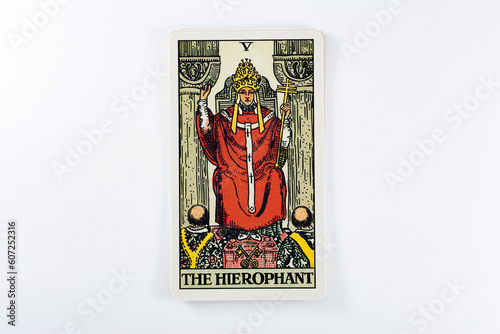 Tarot cards, Rider Waite tarot cards, the hierophant vintage card in the foreground.
