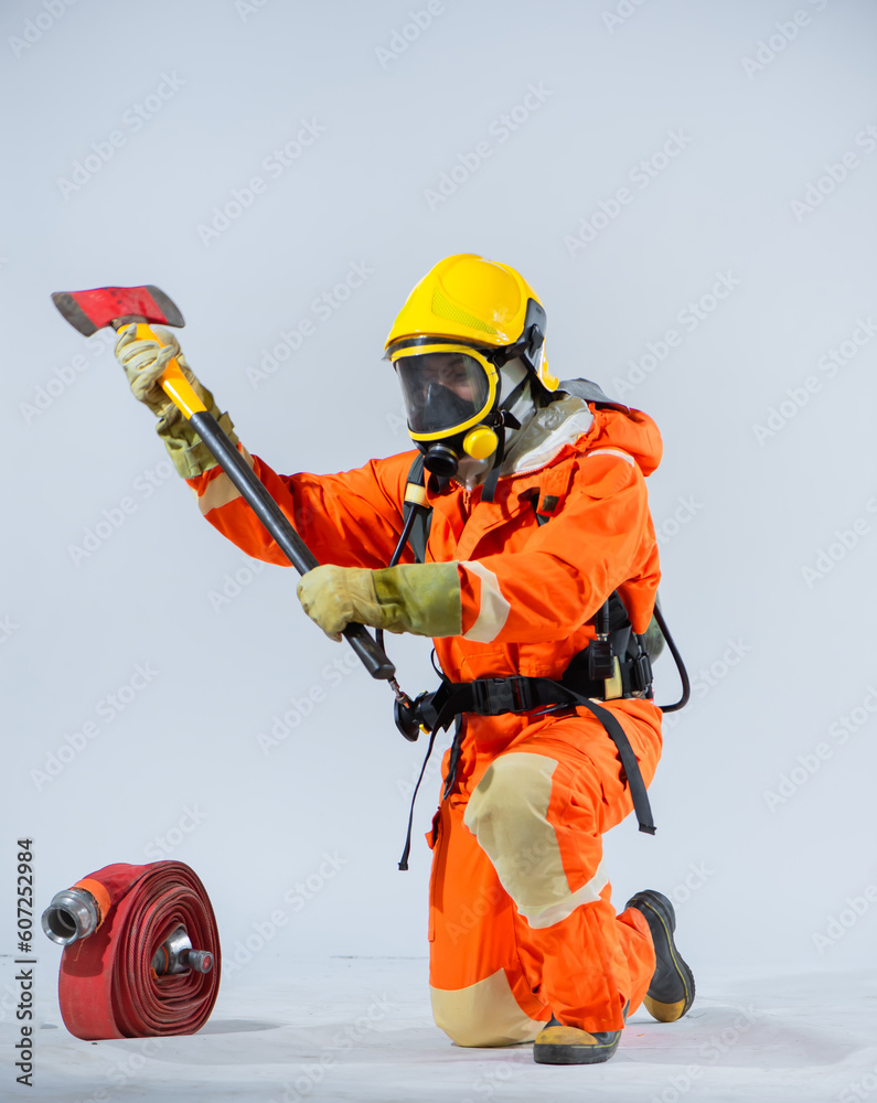 The combination of the firefighter's kneeling posture holding an iron axe and the iron axe highlights their commitment to being proactive and ever vigilant in their duty. The combination of the firefighter's kneeling posture holding an iron axe and the iron axe highlights their commitment to being proactive and ever vigilant in their duty.