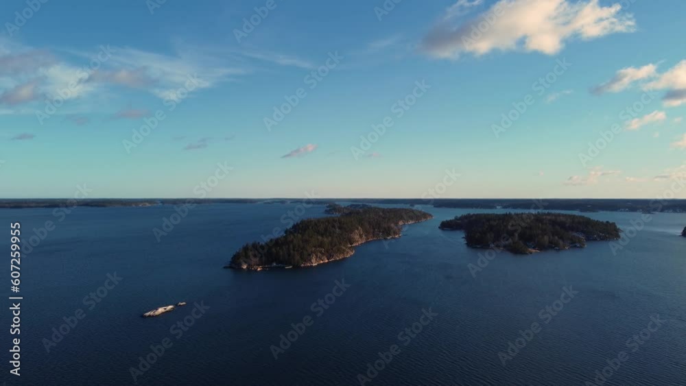 Drone push-in of islands, blue water and distant horizon in Baltic Sea Drone push-in of islands, blue water and distant horizon in Baltic Sea