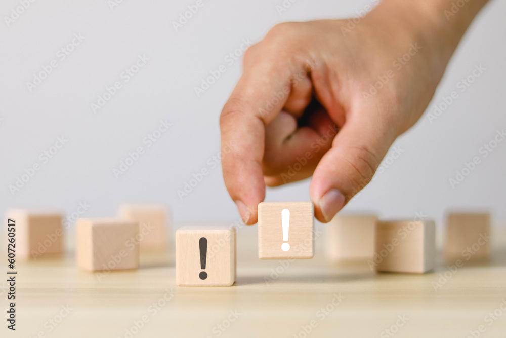 Wooden block showing white exclamation mark, warning, error, notification, maintenance and solution finding, white background. Wooden block showing white exclamation mark, warning, error, notification, maintenance and solution finding, white background.