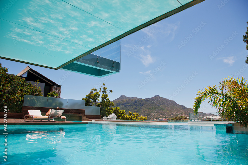 Fototapeta premium Luxury swimming pool with mountain view