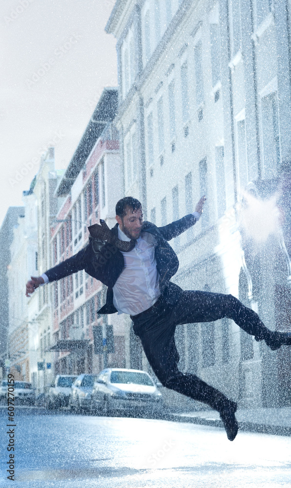 Businessman dancing in rainy street Businessman dancing in rainy street