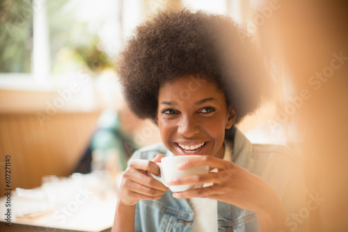Woman drinking coffee in cafe