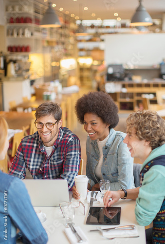 Friends talking in cafe