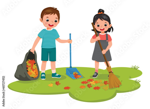Cute little kids boy and girl raking fallen autumn leaves into plastic bag cleaning up in the garden
