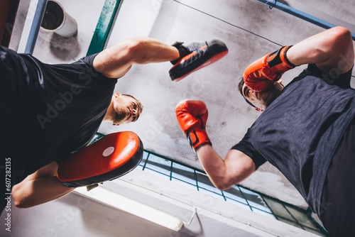 Foto Boxers do boxing training on a gym