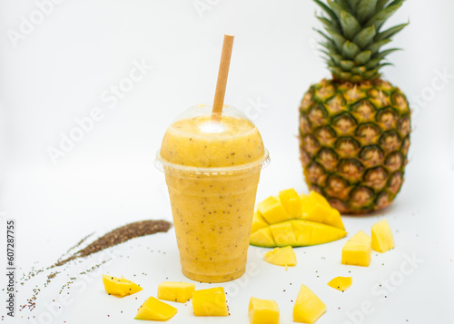 pineapple mango smoothie on a white background