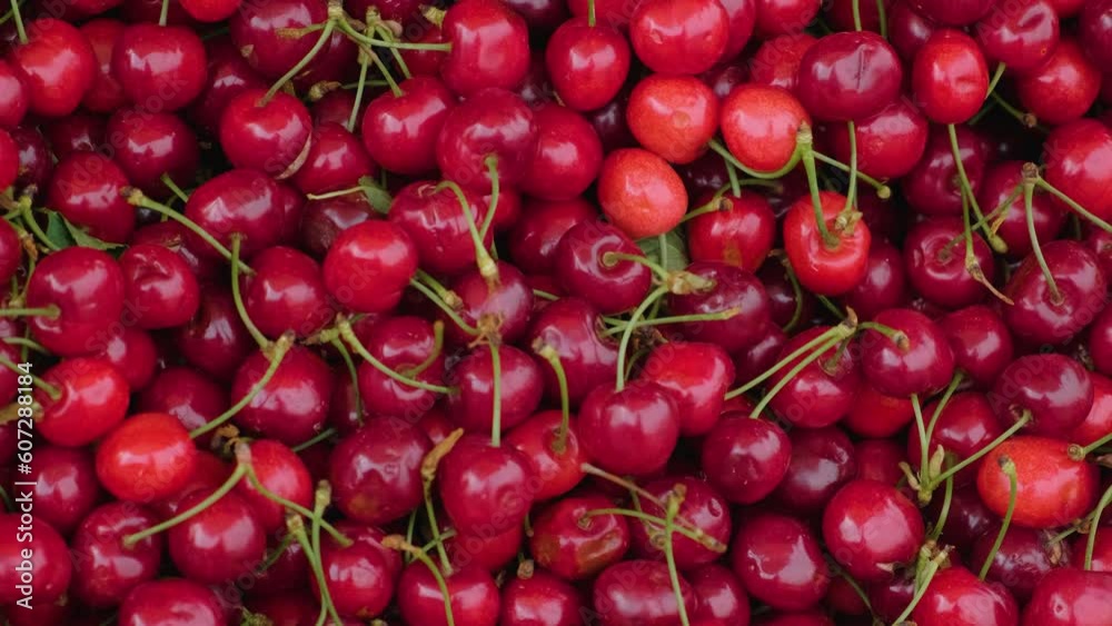 Fresh cherry berries on a local street food market. Farming and agriculture concept. Vegan food. Top view Fresh cherry berries on a local street food market. Farming and agriculture concept. Vegan food. Top view