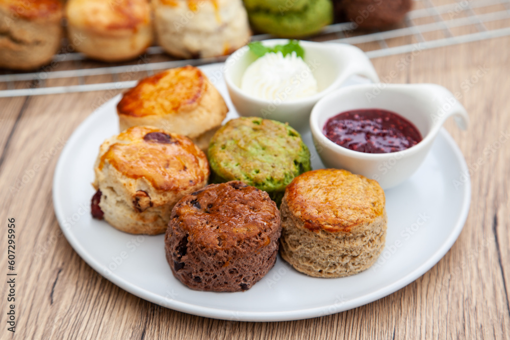 Five flavour of scone, chocolate, butter, cranberry, Earl grey, Matcha, served with clotted cream and raspberry jam. 