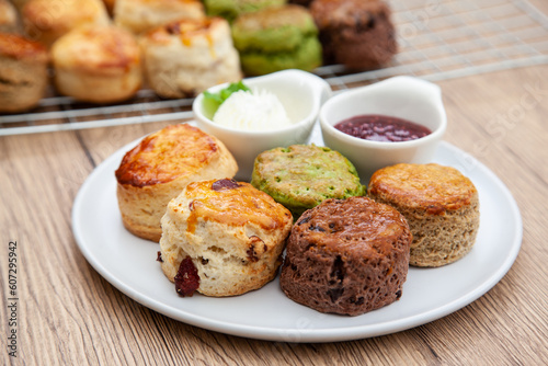 Five flavour of scone, chocolate, butter, cranberry, Earl grey, Matcha, served with clotted cream and raspberry jam. 
