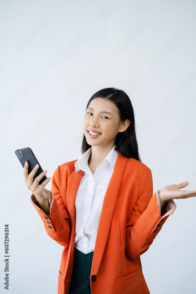Portrait of Asian woman talking mobile phone to empty copy space isolated on white background. Portrait of Asian woman talking mobile phone to empty copy space isolated on white background.