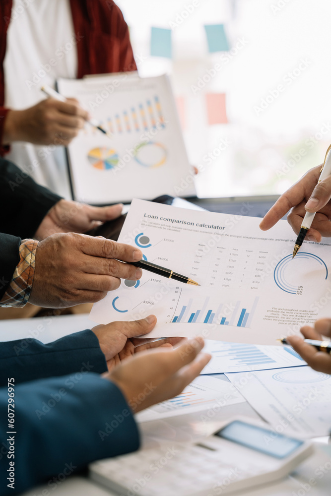 Business man explaining a project to his team. Business man explaining a project to his team.