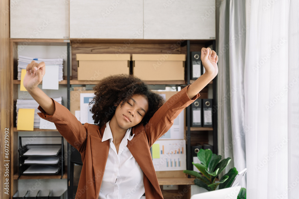 Businesswoman is doing a stretchy posture due to sitting in the office for too long, office syndrome concept. Businesswoman is doing a stretchy posture due to sitting in the office for too long, office syndrome concept.