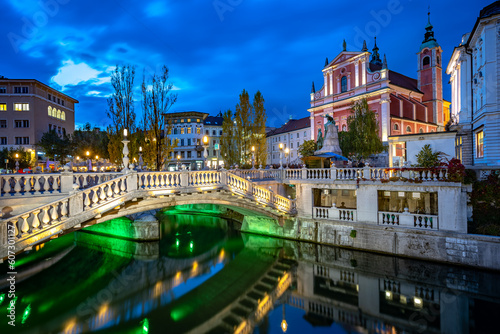 Ljubljana, Slovenia - Triple bridge and Franciscan Church of the Annunciation photo