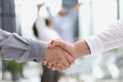 Businessman handshake for teamwork of business merger and acquisition